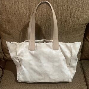 CHANEL Travel Line Cream and Tan Tote Bag with Elegant Design